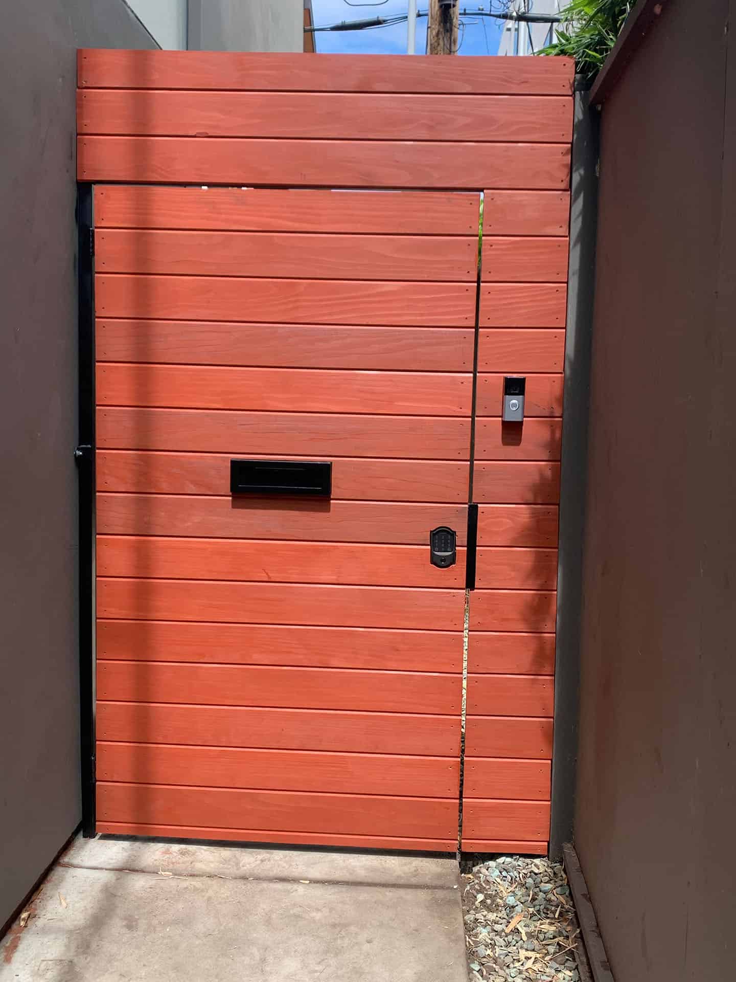 Redwood pedestrian gate with smart lock and mail slot